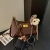 Bolsa de Ombro com Corrente para Axila Feminina Dropshipping 2026 Nova Primavera Verão Luxo Leve Nicho High-End Ombro Único Transversal