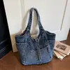 Bolso de mezclilla retro casual 2026 nuevo bolso tote bolso de mano versátil para el trabajo bolso tote de gran capacidad