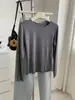 Camiseta base suave y amigable con la piel de lana Tencel para mujer, delicada y elegante, con bordes rizados, color liso, cuello redondo, manga larga, estilo otoño e invierno