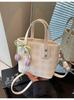 Bolso pequeño popular transfronterizo para mujer Verano 2025 Nueva moda a cuadros Bolso bandolera Estilo coreano Bolso de cubo portátil