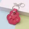 Em Estoque Novo Chaveiro com Estampa de Patas de Animal Estilo Japonês Bolsa para Armazenamento de Pelos de Cachorro Pingente de Pescoço Portátil para Gato e Animal de Estimação