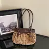 Nuevo bolso de hombro plisado de lunares estilo coreano de nicho transfronterizo, bolso de hombro casual para el día a día, bolso de axila exquisito y moderno