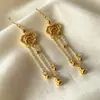 Pendientes Elegantes y Únicos, Nuevo Diseño de Nicho con Carácter de Fortuna Hueco, Nubes Auspiciosas, Borlas de Calabaza, Ganchos para Orejas Estilo Festivo
