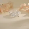 Nuevo anillo de mariposa con filigrana estilo chino, anillo de flor de encaje estilo palacio vintage, elegante anillo de trébol de cuatro hojas para mujer