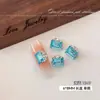Decoraciones para uñas de pedrería K9 azul marino brillante, que ofrecen una estética lujosa y de alta gama, con un diseño en forma de diamante, similar a un terrón de azúcar y sin base