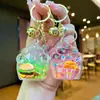 Llavero Colgante Luminoso de McDonald's con Relleno de Aceite Colgante para Mochila de Pareja Regalo Pequeño Actividad Venta al por Mayor