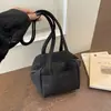 Moda de Verano Color Macarrón Bolso de Mano Pequeño para Mujer 2026 Nuevo Bolso Cuadrado Pequeño Simple Versátil Versión Coreana Bolso de Hombro para Debajo del Brazo