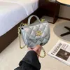 Mini Bolsa Pequeña Bolso de Mano Moda Lindo Acolchado de Diamantes Bolso Cruzado con Cadena Nuevo Estilo Venta Caliente Transfronteriza Celebridad de Internet Bolso Súper Popular