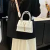 Bolso de Nicho de Diseño Francés para Mujer, Bolso de Mano Pequeño de Moda Ins con Textura, Bolso Cruzado de Color Sólido con Borla