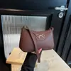 Bolsa de Ombro/Mão Elegante Única de Alta Qualidade Versátil com Padrão Lichia Laço Nova Moda Primavera 2026