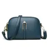 Bolsa cuadrada pequeña multi-compartimento al por mayor transfronteriza, bolsa de moda con forma de concha para exportación, ligera y conveniente para el transporte diario, bolsa de un solo hombro o cruzada, bolso de mujer hecho a medida