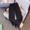 Traje Deportivo Casual de Verano para Mujer 2026 Nuevo Elegante y Moderno Estilo Coreano Conjunto de Pantalones Anchos de Manga Corta Falso de Dos Piezas