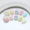 Macarrón de colores gato de dibujos animados flor lazo corazón dulce y juguetón uñas postizas manicura infantil uñas ponibles