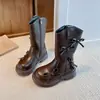 Nuevas Botas para Niñas 2026 Estilo Británico Botas de Moda Infantil Moño Suela Gruesa Con Felpa Versátiles Botas Largas Botas Martin