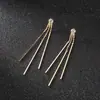 Joyería de moda europea y americana estilo simple temperamento borla delgada chapado en plata aretes para mujer de discoteca E584