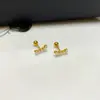Brincos de pérola quadrada em aço titânio, estilo casual, com pequenas bolas onduladas e pérolas em formato de coração, para mulheres. Modelo retrô "Série Pérola".