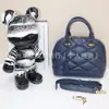 Bolso de Mano Clásico Popular de Comercio Exterior Cuero Genuino Bolso de Mujer Bolso Cruzado de Hombro de Alta Calidad Bolso tipo Concha para Mujer Marca Grande Productos de Guangzhou