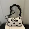 Bolso de hombro tipo bandolera con lunares de moda coreana para mujer 2026 nuevo bolso de mano de nicho estilo dulce para commuting minimalista