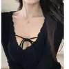 Venta al por mayor transfronteriza Otoño e Invierno 260 g Hecho a medida Sexy Escote Bajo Petite Con cordones Cuello en V Manga larga Camiseta Ropa interior para mujer