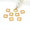 Cobre conservador de color bañado en oro real de 18k, con diseño de trébol de cuatro hojas y estrella huecos, con tapas terminales de doble orificio, para hacer joyería DIY, incluyendo pulseras y collares