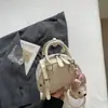 Bolsa de boliche para mujer 2026 modelo nuevo, bolso de mano de alta estética con bloques de color azul claro, bolso de hombro de moda, bolso cruzado para el día a día