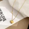 Collar de Amor Coreano Cadena para Clavícula de Mujer Lujo Ligero Sentido de Diseño de Nicho 2023 Nuevo Colgante de Acero de Titanio Versátil Simple