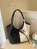 Bolso tote de gran capacidad para mujer, nuevo modelo de verano 2025, bolso simple casual para el hombro estilo ins, bolso versátil de moda para mujer