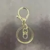 Chaveiro com Fecho Lagosta Pingente de Contas de Boneca Conjunto de Três Peças com Fecho Lagosta Corrente de Quatro Seções Chaveiro com Fecho de Oito Acessórios