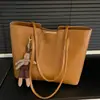 Bolso de Estilo Coreano Transfronterizo para Mujer 2026 Nuevo Bolso de Hombro Único Simple Retro Bolso Tote Texturizado para Clase y Viaje