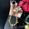 Cadena para Teléfono Móvil de Año Nuevo Cadena Roja Festiva de Cristal Pujiang León Despertando Rico Aleación Gato de la Suerte Cadena Colgante para Teléfono Móvil Venta al por Mayor