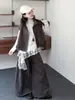 Nuevo conjunto informal de tres piezas suelto para niñas de otoño: Camisa base, chaleco y pantalones de pierna ancha, adecuados para niños mayores, con un look retro en capas moderno