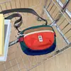 Bolso bandolera para niños estilo coreano con bloques de color dopamina, bolsa ligera para deportes al aire libre para niños y niñas, bolso bandolera de moda para ciclismo