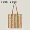 Moda Dropshipping Bolso Tejido de Cuerda de Papel Rayado de Color Contrastante Hueco Simple Gran Capacidad Bolso de Viaje Bolso Tejido Versátil