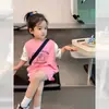 Conjunto de Ropa de Verano para Niñas: Camiseta de Manga Corta Falsa de Dos Piezas y Pantalones Cortos Casuales para Bebés, Ropa Infantil de Moda de Huzhou Zhili
