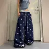 Pantalones casuales de pierna ancha con cordón, estampado de estrellas completas en color contrastante, estilo callejero americano, corte holgado, hasta el suelo, para hombres y mujeres