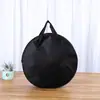 Bolsa de mano de tela Oxford al por mayor de fábrica, logo personalizado, bolsa de compras impermeable para regalo, bolsa de embalaje redonda de tela Oxford