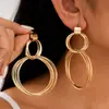 Pendientes Redondos Multicapa Huecos de Aguja de Acero Transfronterizos Europeos y Americanos, Exagerados y Elegantes, Pendientes Versátiles con un Toque de Lujo Ligero y de Alta Gama para Mujer