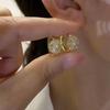 Pendientes con hebilla de oreja de copo de nieve de diseño de nicho para mujer, de alta gama, con sentido pequeño y exquisito, de temperamento, nuevos pendientes de moda al por mayor