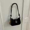 Bolso de axila para mujer, nueva colección de otoño 2026, estilo retro, adecuado para ir al trabajo, bolso de un solo hombro, exquisito bolso bandolera de gamuza