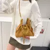 Bolso de cadena acolchado estilo Chanel vintage para mujer, bolso tipo cubo con cordón de gamuza nuevo, bolso de hombro y cruzado único y simple