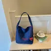 Bolsa de Lona Casual de Grande Capacidade para Mulheres 2026 Novo Modelo Leve Versátil para o Dia a Dia Ombro Transversal Tote Bolsa Saco
