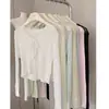 Tejido de punto con inserciones de encaje francés y cuello en V para mujer a principios de primavera, nuevo, elegante, ajustado y versátil, top chic con cordones