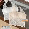 Camisola de renda com gola halter para mulheres, adequada para usar sob um terninho, com bojos embutidos e um lindo design nas costas, top sem costas integrado