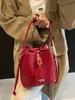Bolsa de cubo suave de PU de alta gama al por mayor para mujer 2025 Nueva moda moderna Bolso de hombro versátil Bolso cruzado estilo occidental