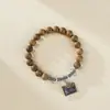 Pulseira de Sândalo Nova para Outono e Inverno com Toque de Luxo, Design de Lótus, Joia Versátil Estilo Chinês Novo, Acessório de Pulseira de Contas Estilo Chinês Tradicional