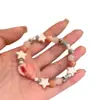 Vacaciones de Verano 2024 Pulsera de Cerámica con Cuentas de Caracola y Estrella Estilo Nicho Exquisita de Alto Valor Pulsera para Novia