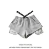 Estilo de chica calurosa de verano cintura elástica etiquetado cintura ajustada pierna ancha holgada pantalones cortos casuales calientes piernas largas pantalones cortos de cintura alta para mujer