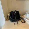 Bolsa de Cubo de Agua Nueva Otoño 2026 Moda Femenina Versátil Bolso de Mano Bolso de Hombro para Viajes Diarios Bolso Cruzado Simple