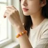 Zhou Lianfa Venta al por mayor Comercio exterior Taobao Ágata Negro Natural Ojo de Tigre Cristal Rosa Estilo Étnico Pulsera de Joyería Regalo