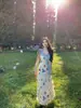 Venta al por mayor transfronteriza Vacaciones de verano en la playa Vestido de tirantes finos floral estilo francés para mujer Ajuste ceñido Versátil Vestido largo